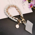 Leather Pearl Camellia Phone Charm Bracelet – Anti-Loss Wrist Strap, 26cm – White, Pink, Black